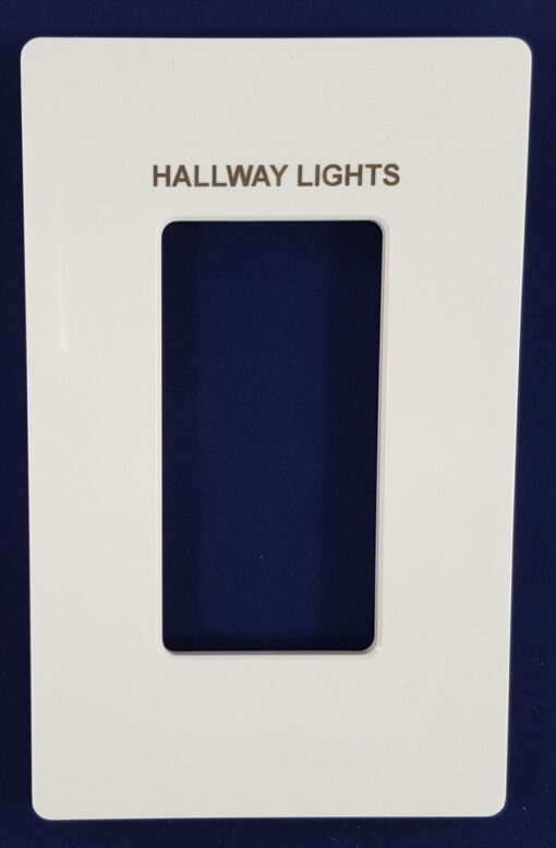 an engraved Lutron plate in gloss white with engraving