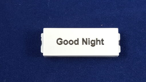 A Good Night Label in Black on White Button